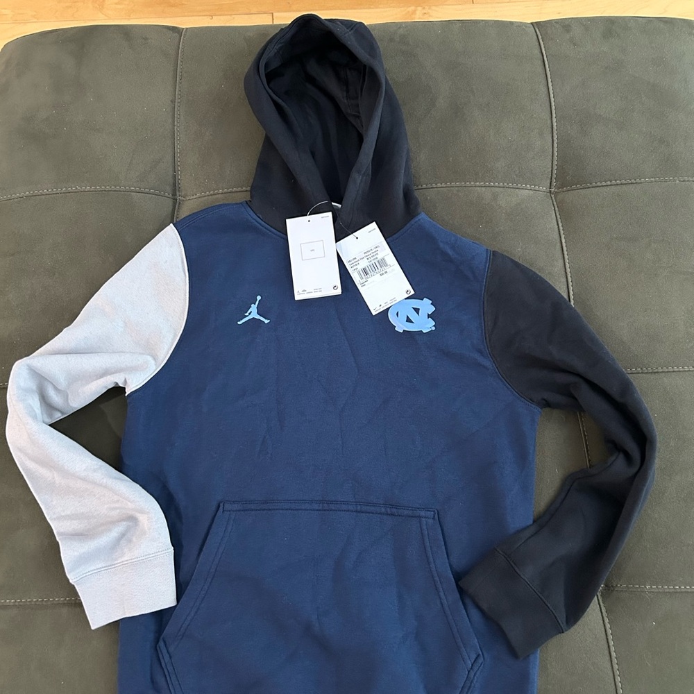 New With Tags. Nike Blue and Black Hoodie with UNC Logo
